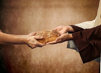 Jésus donne du pain à quelqu'un