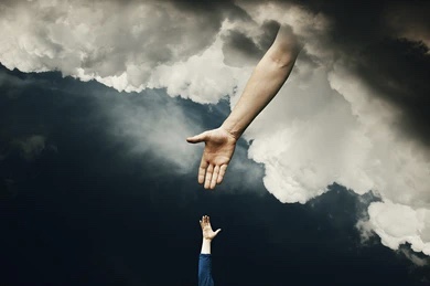 La main de Dieu voulant donner la main aux personnes élues